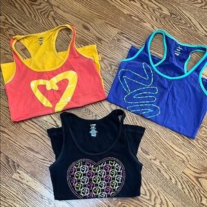 Zumba Tank Lot of three Size large. Must see!